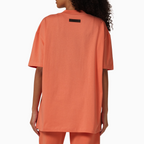 Fear of God Essentials Tee Coral