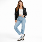 Woman wearing Adidas Samba OG Cloud White Core Black (GS) sneakers with light-wash jeans, a white crop top, and a black leather jacket.